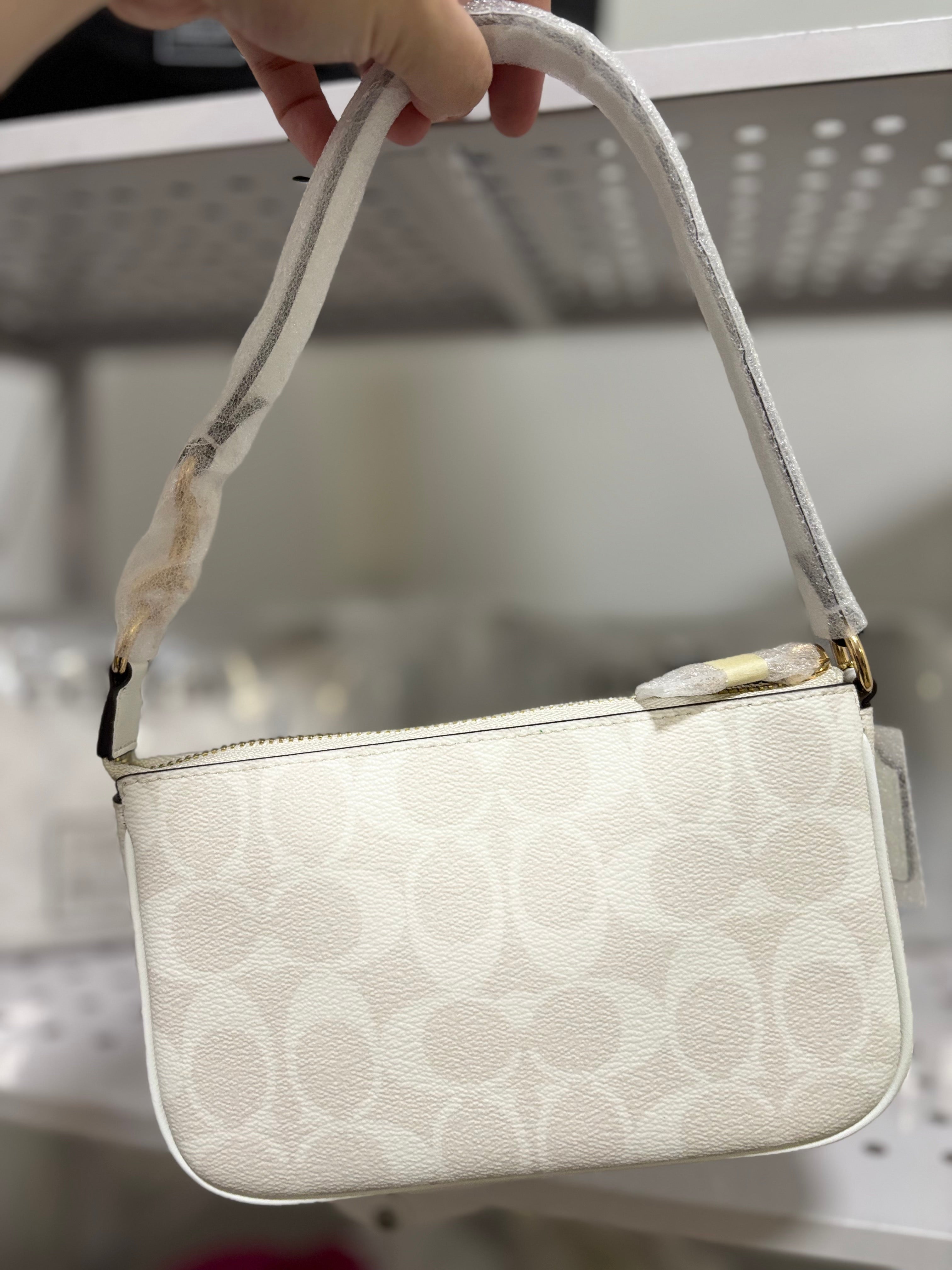 COACH Nolita 19 In Blocked Signature Canvas In Glacier White