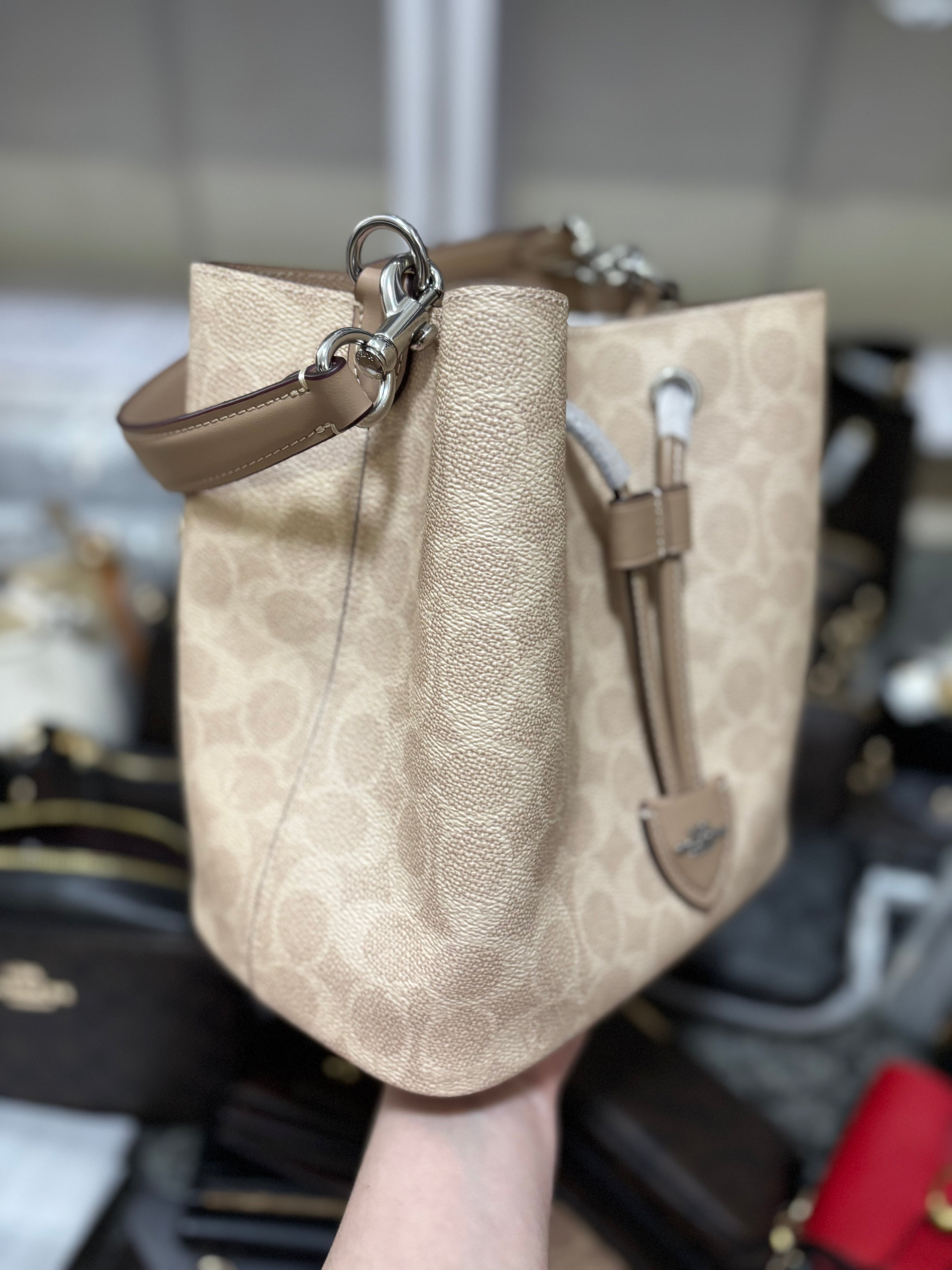 COACH Rowan Bucket Bag In Signature Canvas Sand Taupe