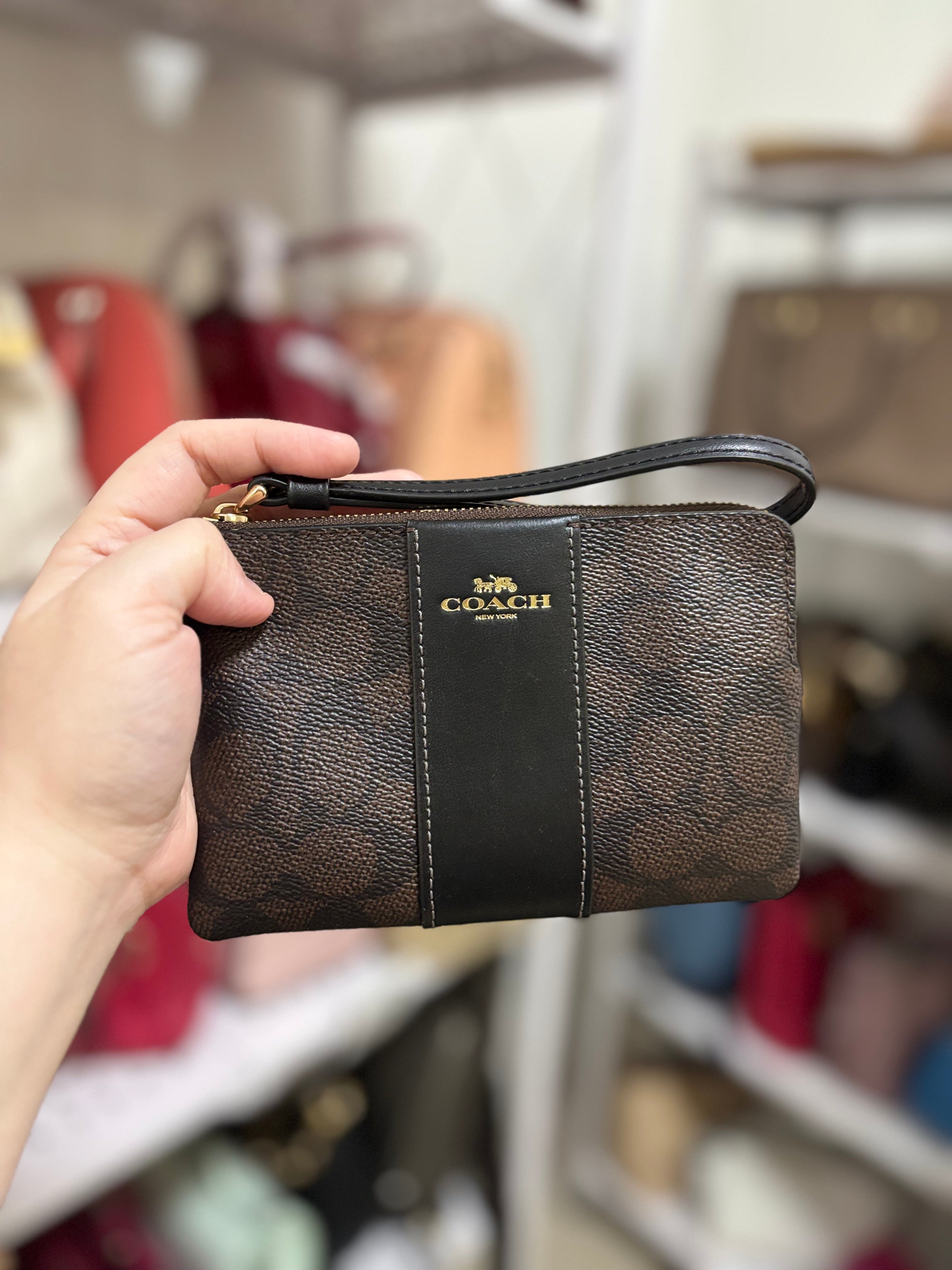 COACH Corner Zip Wristlet in Signature Canvas