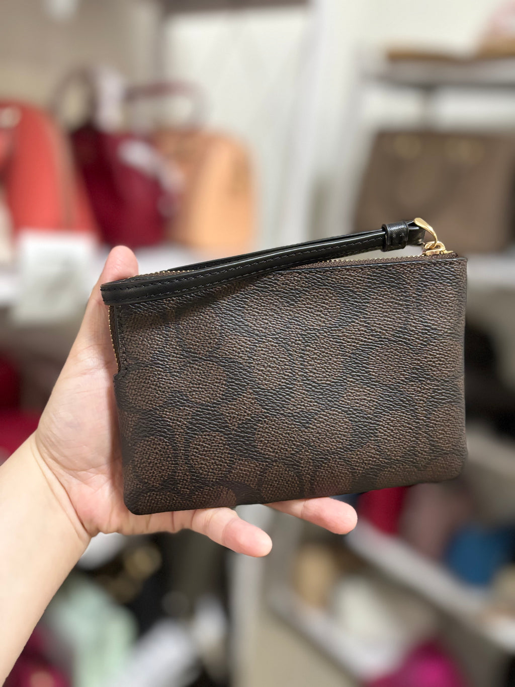 COACH Corner Zip Wristlet in Signature Canvas