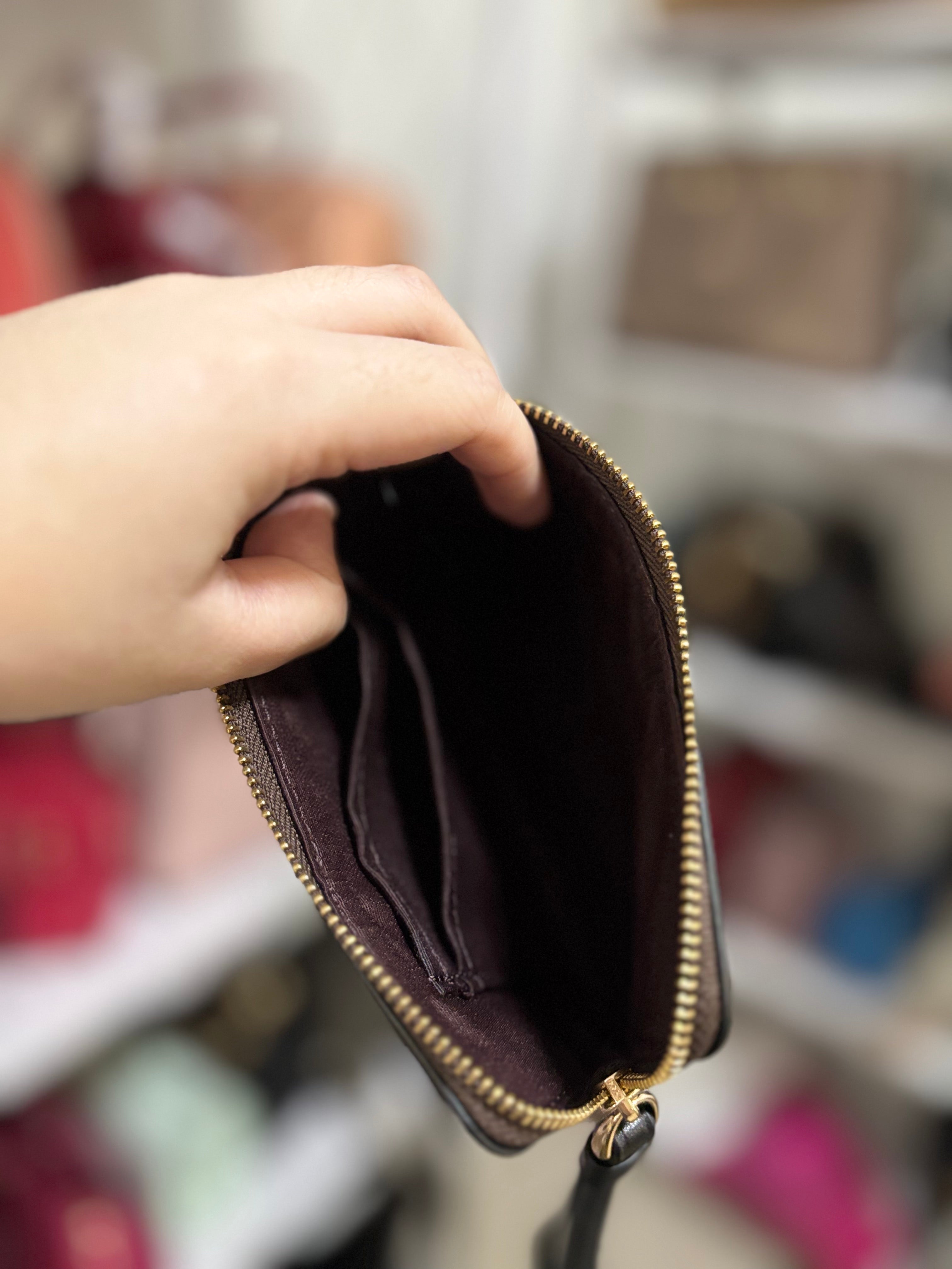 COACH Corner Zip Wristlet in Signature Canvas