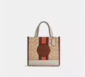COACH Dempsey Tote Bag 22 In Signature Jacquard With Stripe And Coach Patch