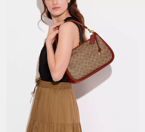 COACH Cary Crossbody Bag In Signature Canvas - Tan Rust