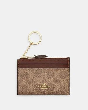 COACH Mini Skinny Id Case In Signature Canvas - Brown