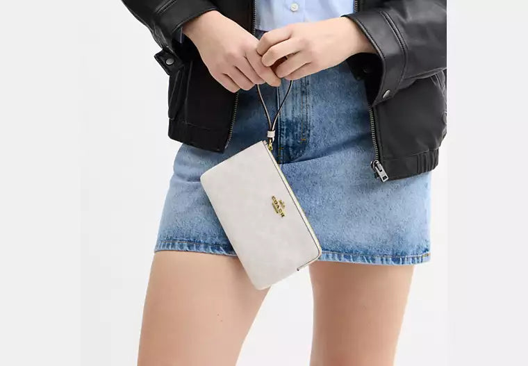 COACH Large Corner Zip Wristlet In White Signature Canvas